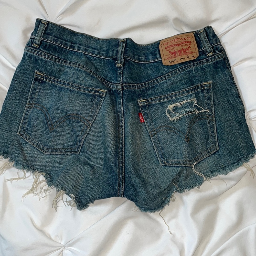Distressed denim shorts